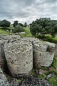 Selinunte Cave di Cusa. The quarry utilized for temple columns, today it is still possible to observe blocks and drums at different stages of preparation. 